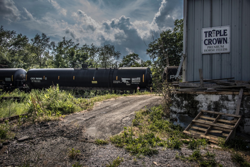 A bomb train passes by a feed store in Mount Pleasant Township, Washington County, PA. Families in Washington Co., Pa who are facing possible issues through the creation of cybergentic gas processing plant in western Pa. A feed store, Mount Pleasant Township